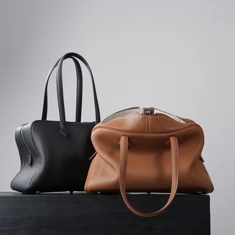 

High Quality Half Hand Sewn Steel Hardware First Layer TC Cowhide Portable Shoulder Commuting Large Capacity Travel Bag Unisex