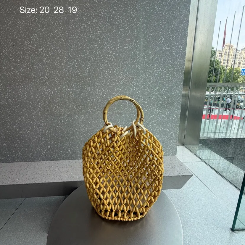 

Fashion Bamboo Handle Handmade Nature Wood Beads Shoulder Bag Women Hollow Out Vintage Handbag Purse Designer Basket Bucket Bags