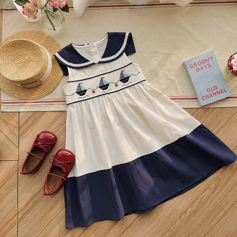 

Navy Sailboat Embroidered Girls' Dress2026Summer style pleated cotton sleeveless collared children's dress in school style