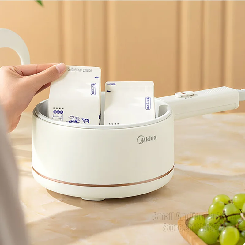 ميديا طباخ كهربائي صغير 1.6L متعدد الوظائف المنزلية جهاز طهي الأرز غير عصا مقبض طويل وعاء الطبخ الكهربائي عنبر