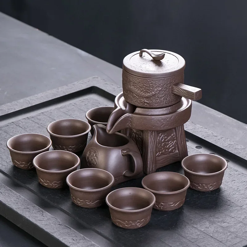 Purple Clay Stone Grinding Semi-automatic Tea Set Creative Kung Fu Tea Hot Sales of Tea Set.Creative Tea Ceremony Supplies Cup