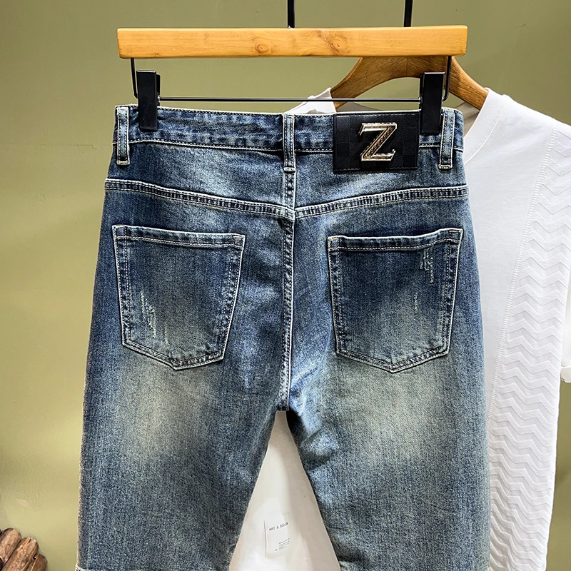 Personalized fashion street splicing patch biker men's jeans trendy casual retro stretch slim tight men's pants