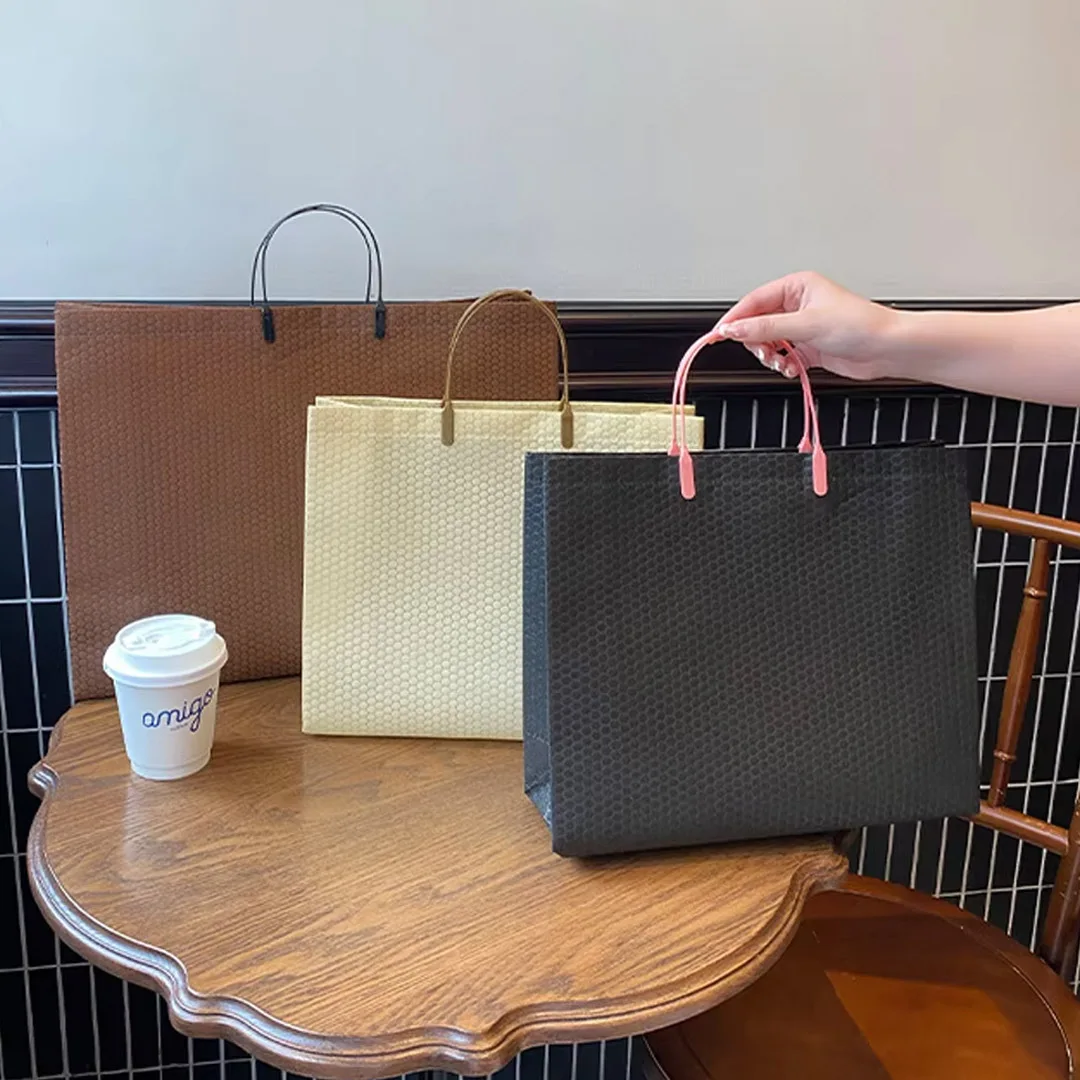 25 قطعة مجوهرات غير منسوجة حمل مقبض حقيبة الزفاف عيد ميلاد التسوق حفلة فستان يومي تي شيرت القماش مستحضرات التجميل تغليف الهدايا