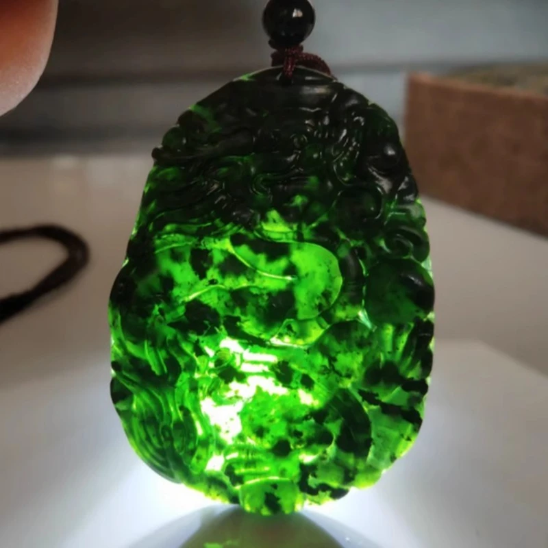 

The natural dark green jade plate dragon pendant, a Chinese dragon pendant, symbolizes good luck, warding off evil