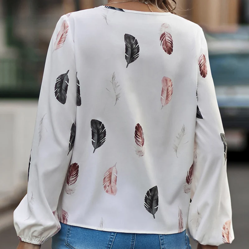 Chemisiers pour femmes Vintage plume imprimé col en v T-Shirt à manches longues coupe ample Blouse hauts Boho Chic femme mode chemises décontractées
