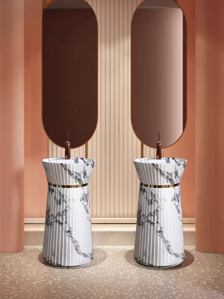 

Italian light luxury Bulgari washing table creative stone pattern column basin integrated floor wash basin