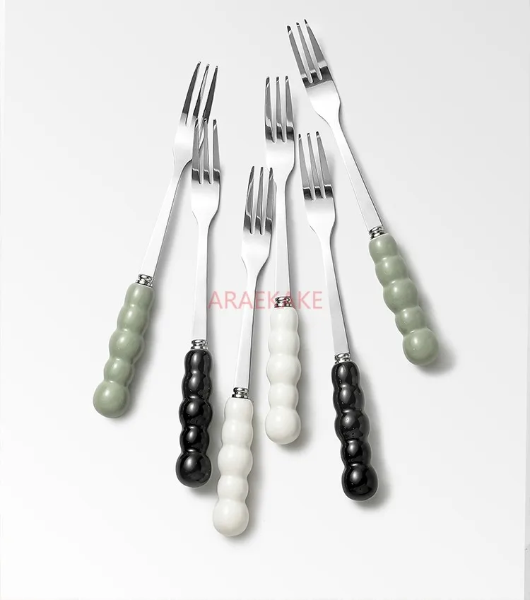 Ceramic household stainless steel fruit skewers, snacks, forks, desserts, cake inserts, light luxury cans, high-end set