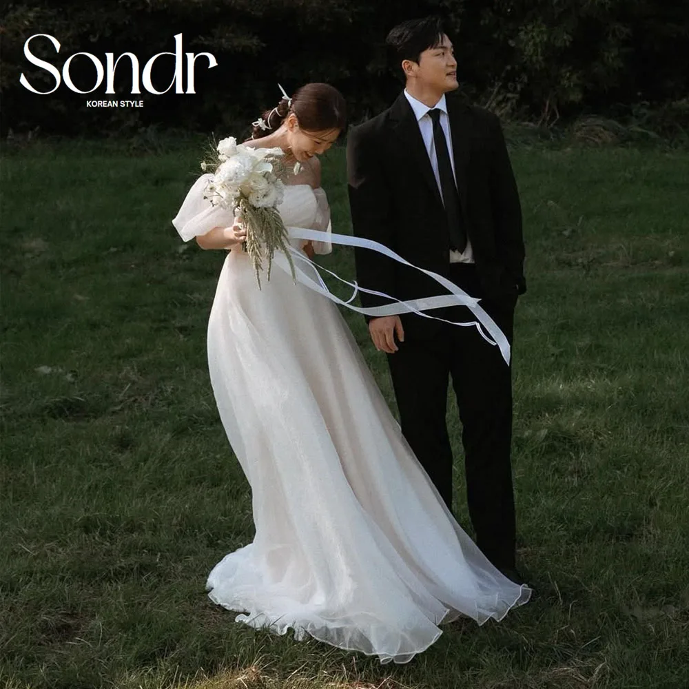 Sondr قبالة الكتف الحرير الأورجانزا فساتين الزفاف الكورية في الهواء الطلق صورة تبادل لاطلاق النار فساتين الزفاف المفاجئة ثوب مخصص