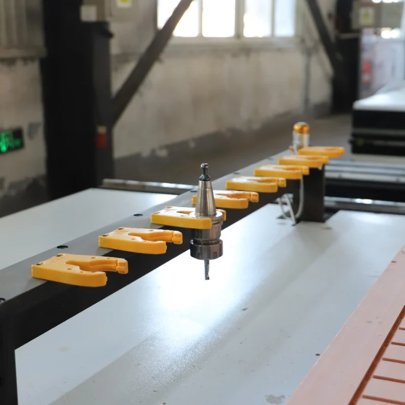 The four-axis CNC woodworking milling machine is designed for 3D wood cutting, milling, and carving, featuring a marking head.