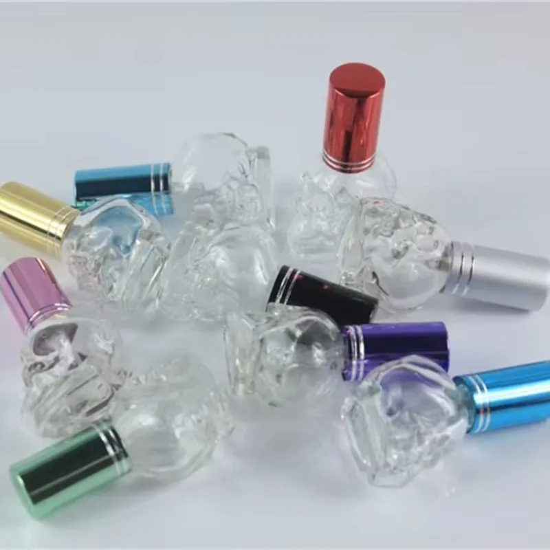 10 قطعة 8 مللي بوضوح الجمجمة شكل مصغرة صغيرة فارغة الزجاج عطر زجاجة عينة زجاجة مع الألومنيوم كاب رذاذ