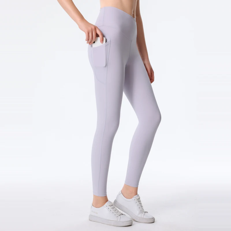 Nowe brzoskwiniowe spodnie do pośladków do jogi damskie ćwiczenia gimnastyczne Push Up ćwiczenia Fitness rozciągliwe legginsy do jogi w jednolitym