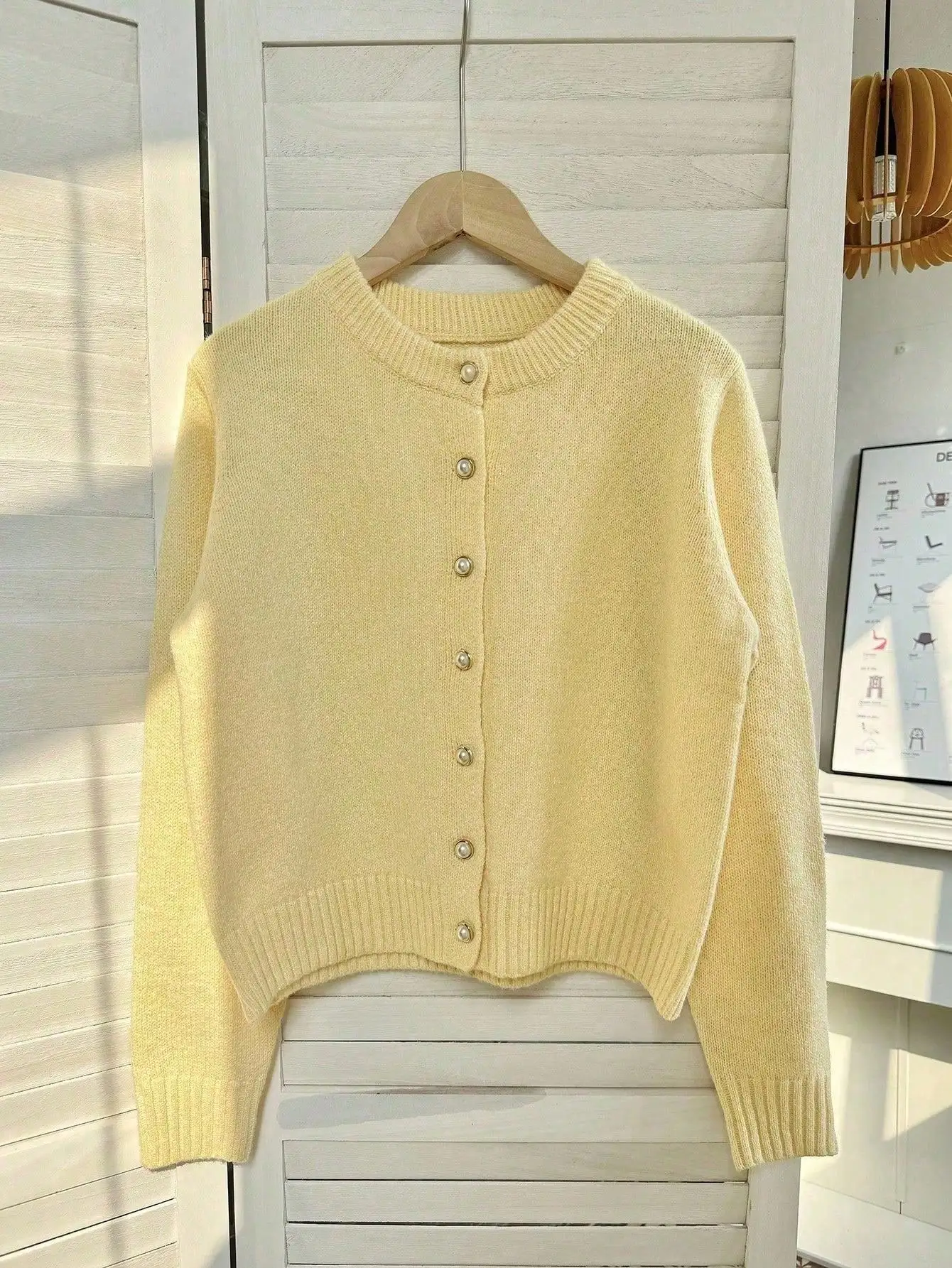 

Women's Minimalist Knit Cardigan with Pearl Buttons, Soft Yellow, Cropped Fit for Casual or Formal Wear