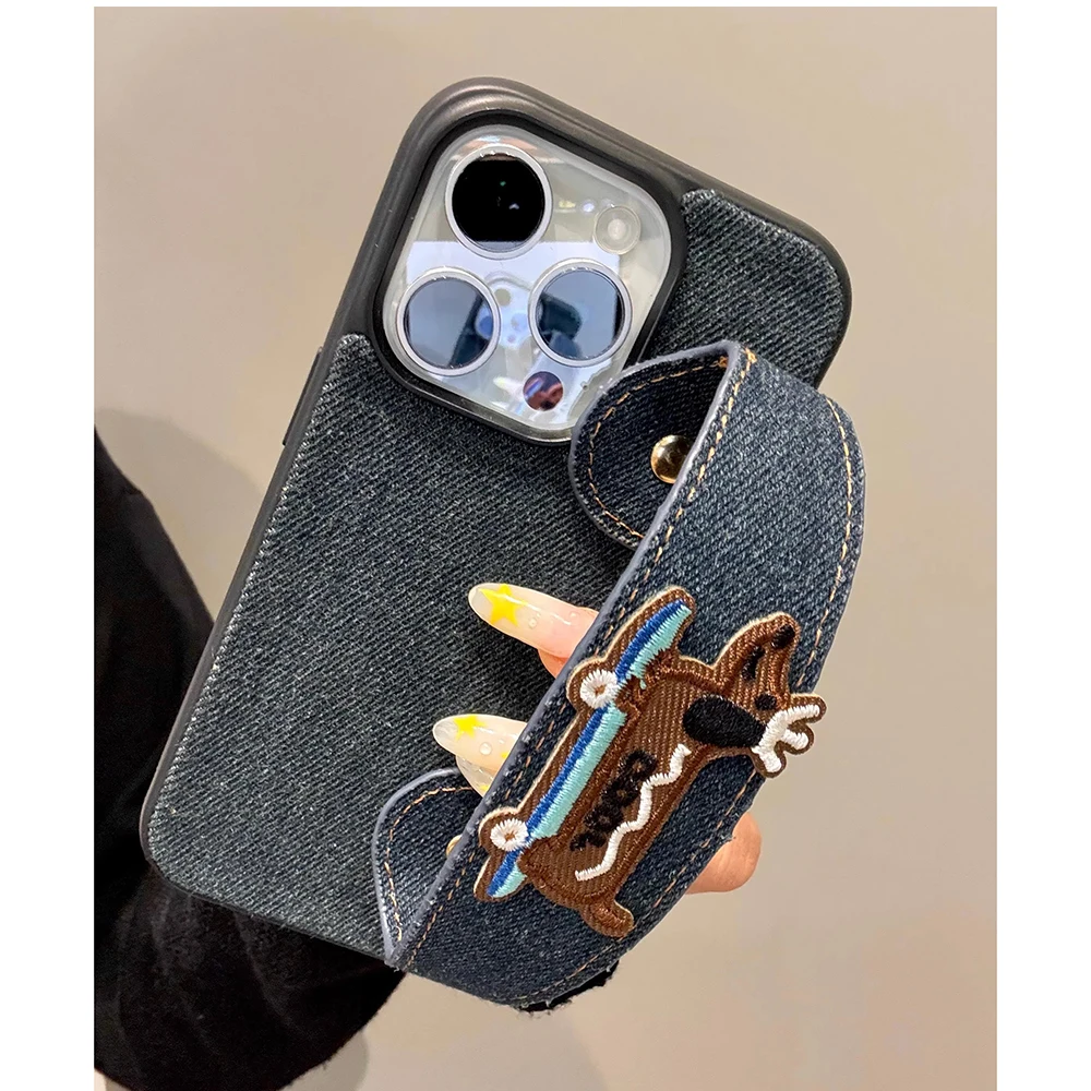 

Cute Cartoon Puppy Denim Textured Wristband Wrist Strap Phone Case for IPhone 16 15 14 13 17 Pro Max Shockproof Soft Cover Case
