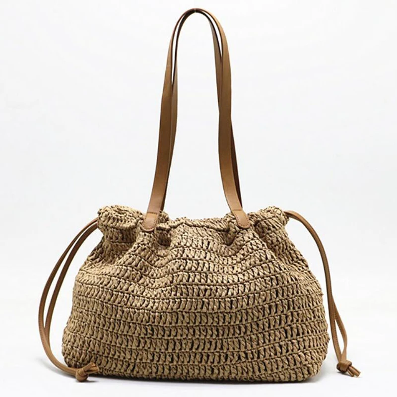 

2026 New Brown Woven Straw Bucket Bag Women's Summer Beach Tote Casual Drawstring Shoulder Bag for Vacation Daily