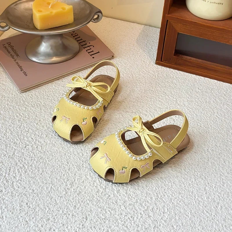

Пляжная обувь для девочек, милая детская обувь принцессы с простыми бантиками, новинка лета 2024, детские сандалии, повседневные элегантные сандалии на мягкой подошве