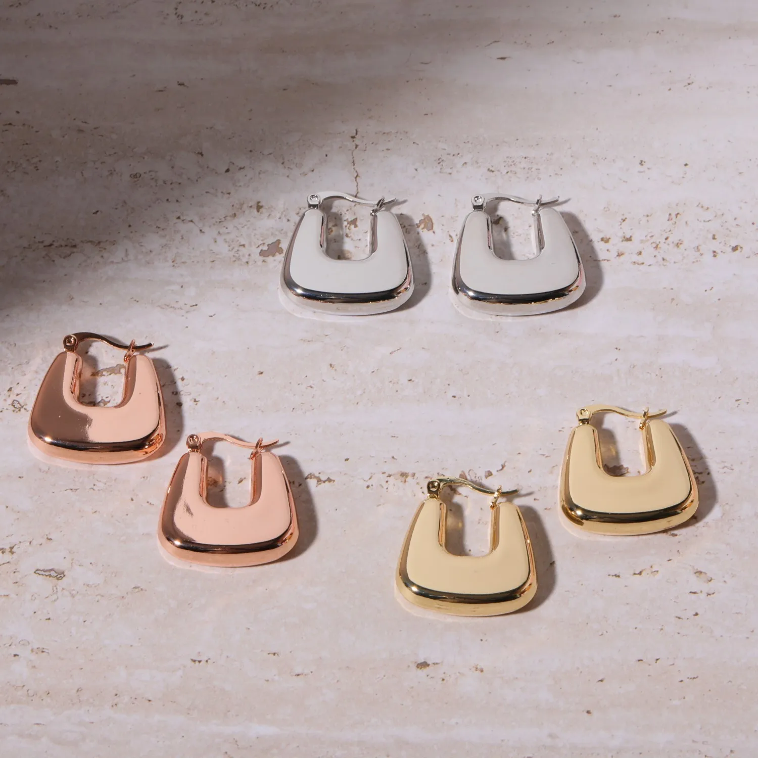 

Stainless steel mirror earrings with geometric feel, French style light luxury titanium steel hollow earrings