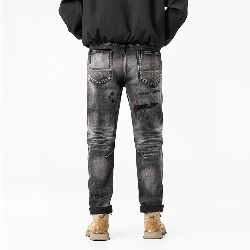 أسود وجينز للرجال، طراز خريف 2025 الجديد، سراويل حنين كلاسيكية بفتحة ممزقة ومستقيمة الساق