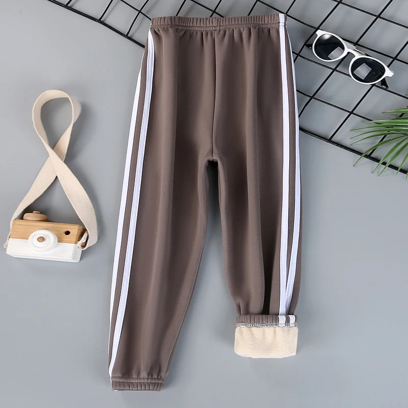 Autumn and winter children\'s solid color sports plus velvet pants boys and girls comfortable leisure warm sports fashion pants.