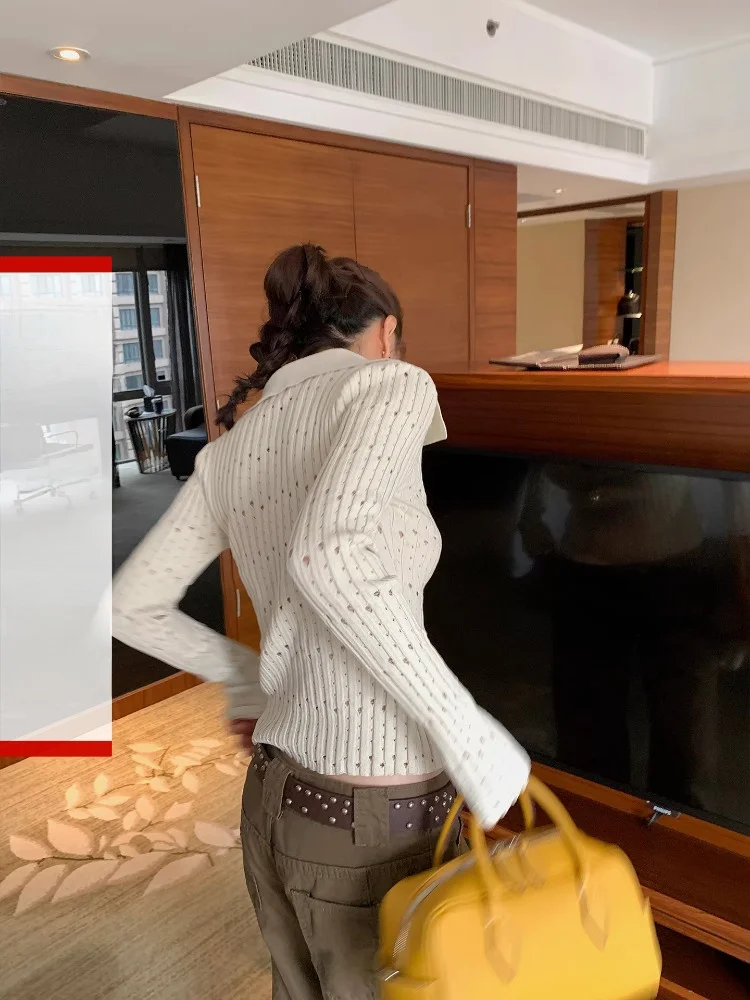 

DULA Good Home Cheese Wer Ne Long Sve Knitted Sweater Women's Hollow out Design Slim Fit Top Korean Sle Commute