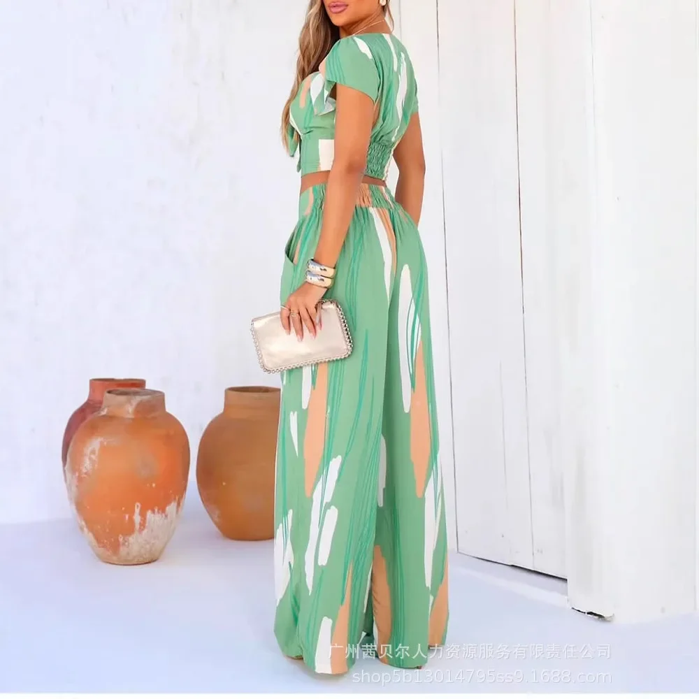 

Женский комплект из 2-х предметов с цветными блоками и v-образным вырезом с пышными рукавами, укороченный топ с нерегулярными завязками и повседневные широкие брюки с высокой талией