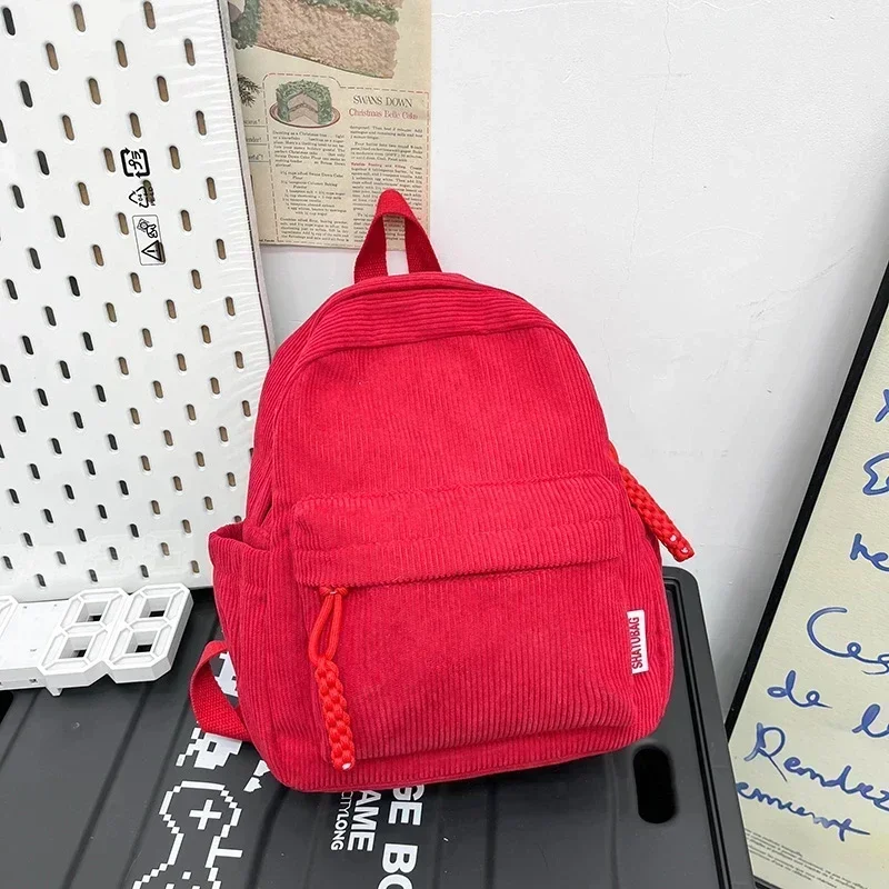 

Little Corduroy Backpack Girl New Casual Striped Bag for Autumn/Winter 2024 All Kinds of Forest Schoolbag Ein Modenrucksack.