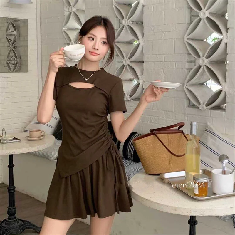 

2024 Summer New Age Reduction Fashion Irregular Flesh Hollow-out T-shirt Top Set For Women + sports Skirt Two-piece Set Tide