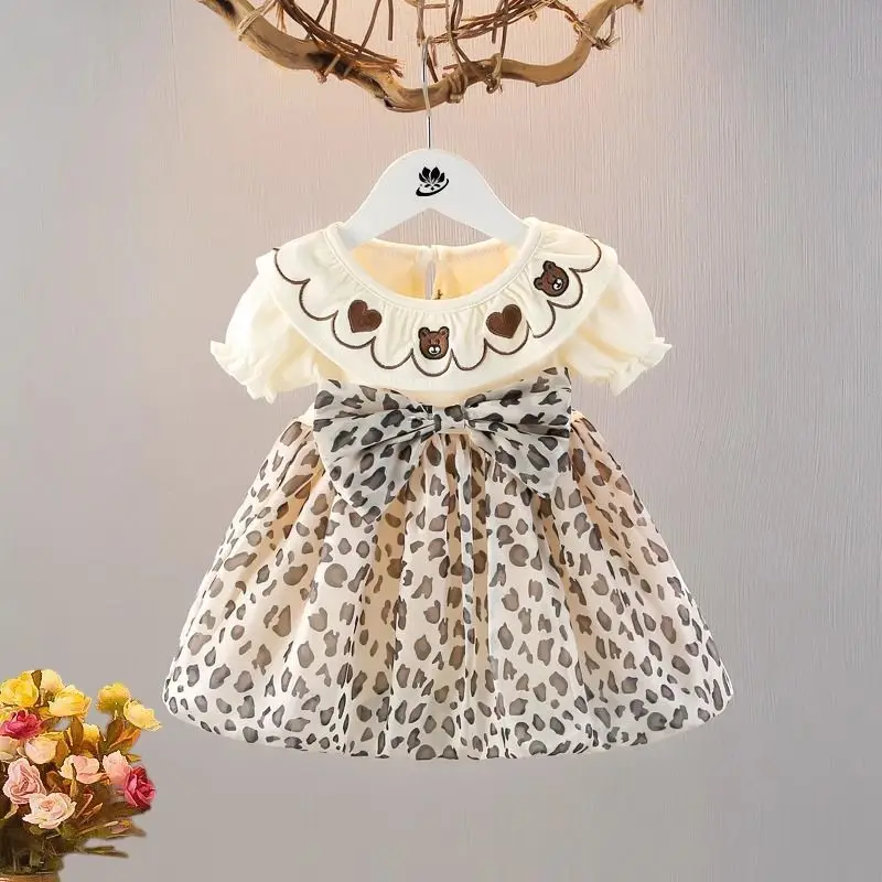

2026 New Summer Children's Doll Collar Embroidered Pattern Short Sleeve Waist Splicing Leopard Pattern Dress