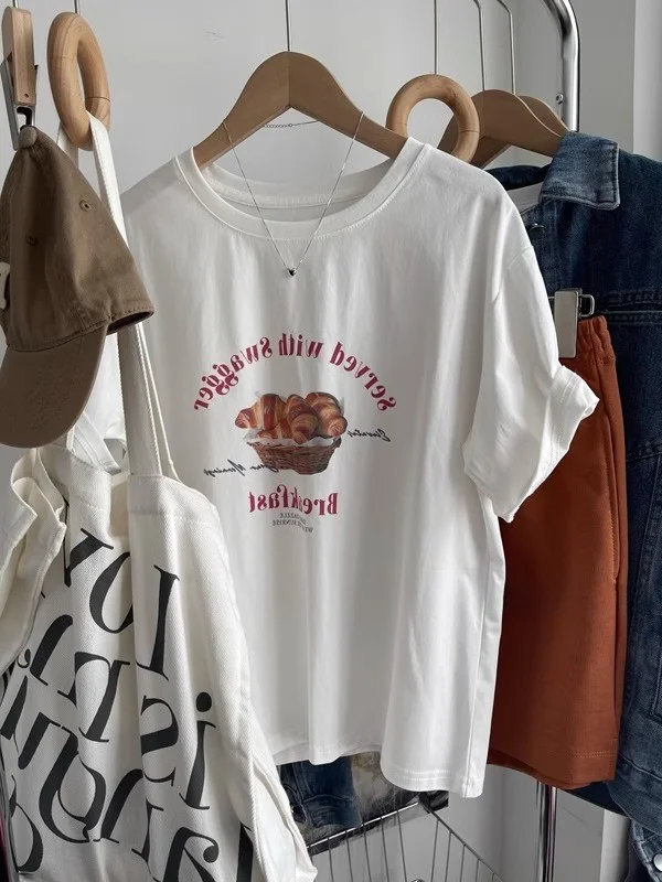 

Женская летняя футболка больших размеров из чистого хлопка, белая, с коротким рукавом, свободного кроя, с принтом, круглый вырез, модный топ