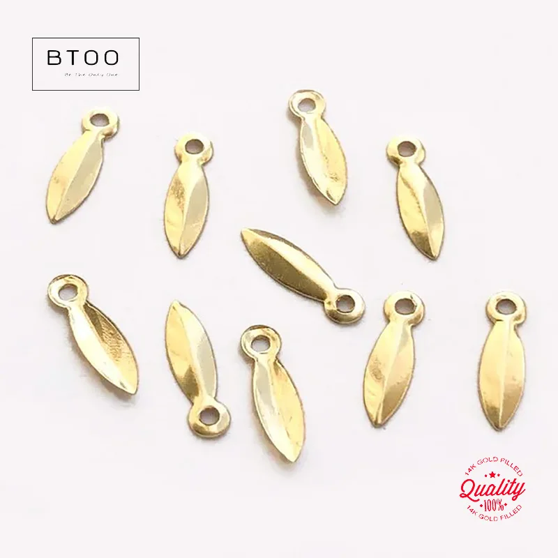 

Подвеска в виде листа с позолотой 14 карат 2,7x9,6 мм с отверстием 1,1 мм, подвеска для ювелирных изделий для оптовой продажи ювелирных аксессуаров
