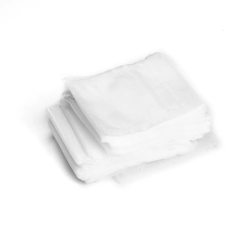 Drawstring Closure Empty Tea Bags Non-Woven Material 5.5*7cm Size Non-Woven Tea Bags White Color Disposable Design