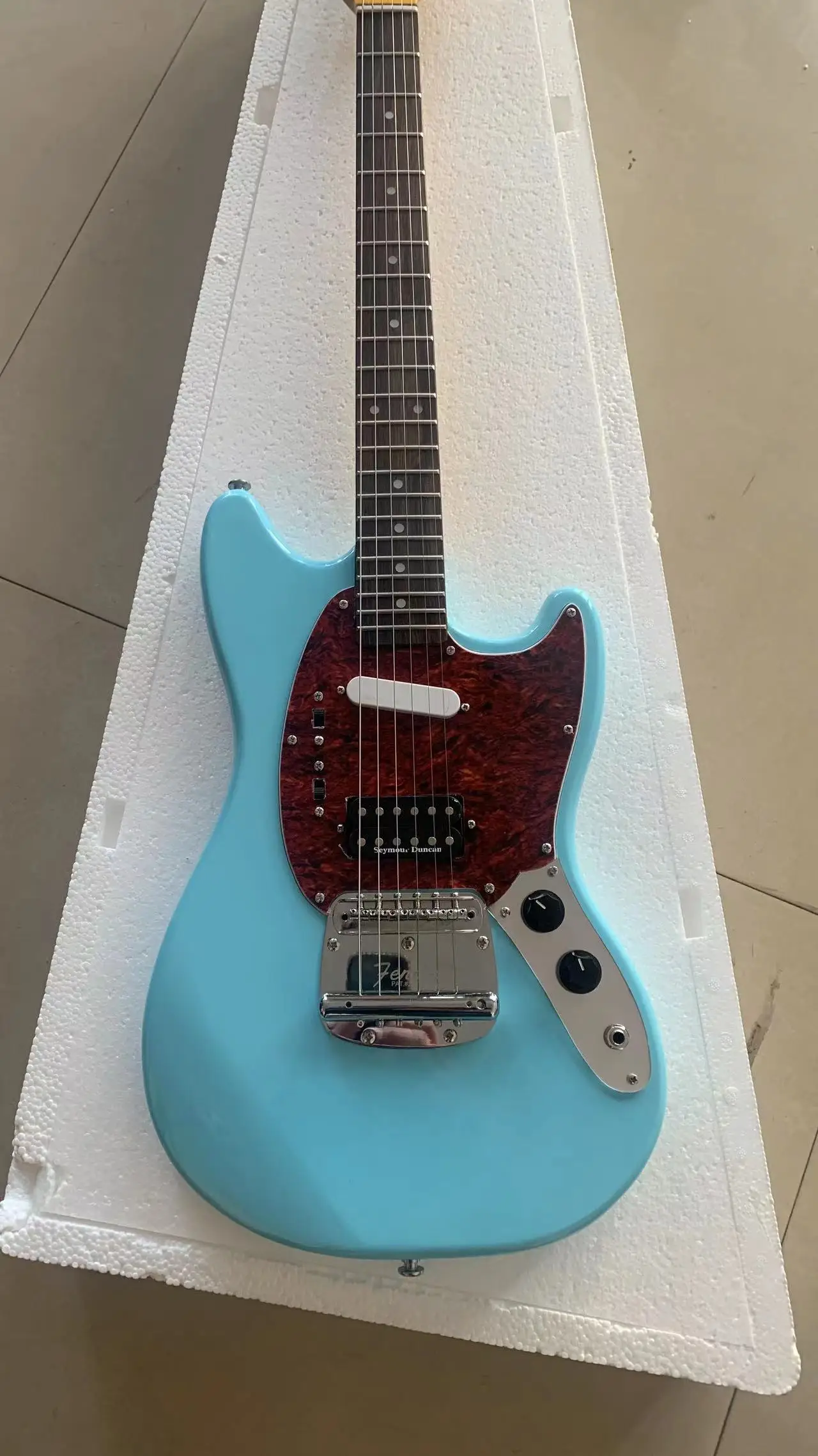 Light Blue Jazz 6-string electric guitar Red guard board Vibrato Rose Wood fingerboard Free shipping