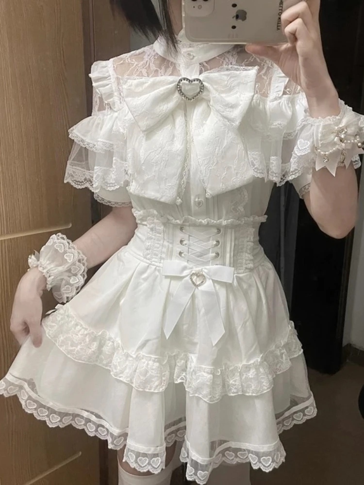 Camicia da donna versatile dolce e carina monopetto a maniche lunghe con fiocco a cuore in patchwork di pizzo prodotto in serie in stile miniera giapponese per le donne