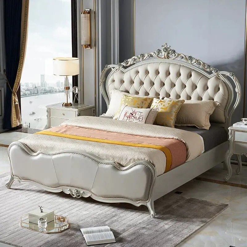 French country-style tufted upholstered bed with carved wood frame