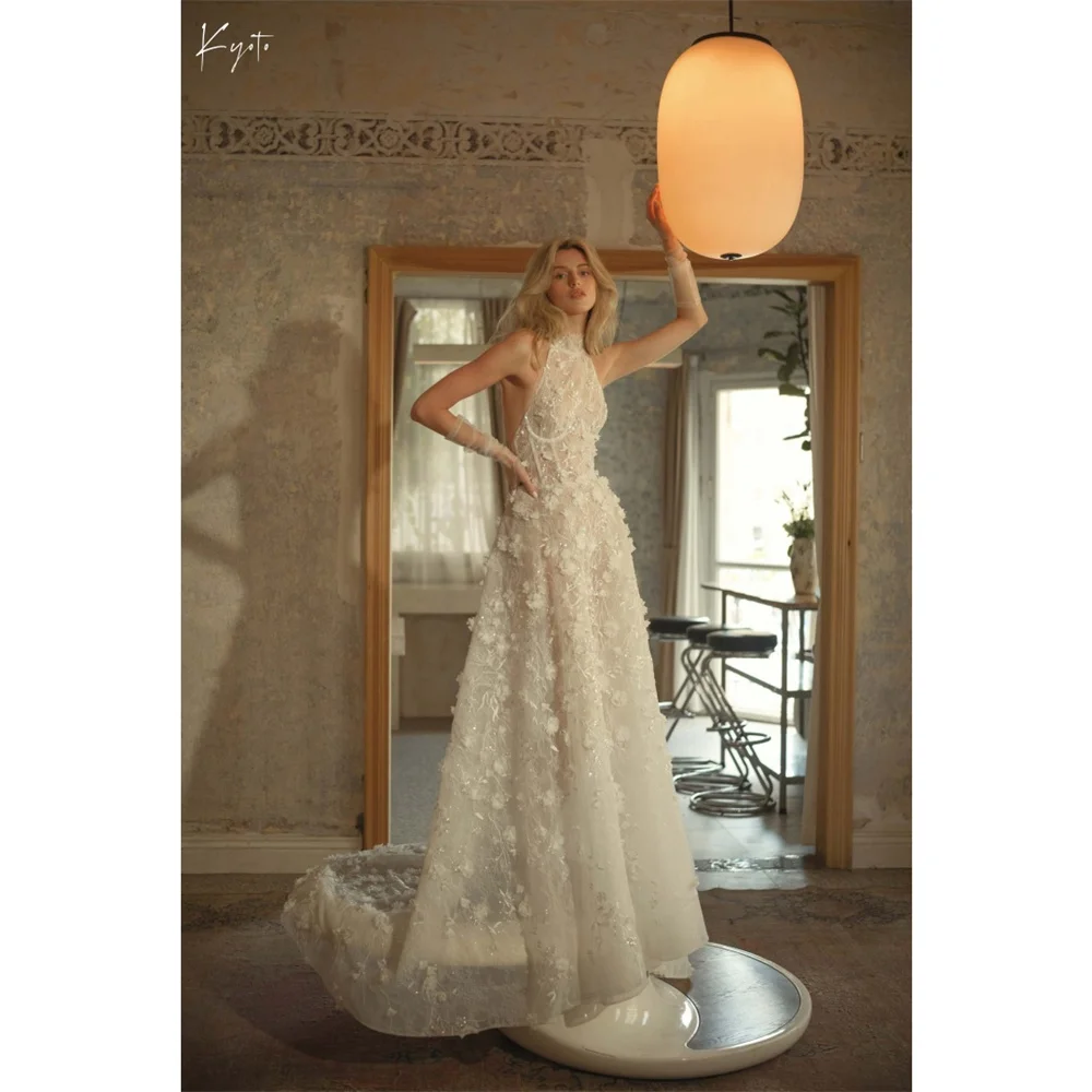 Suknia ślubna Kyoto z koronkowymi aplikacjami w kolorze kości słoniowej, z odkrytymi plecami i dekoltem typu halter, trenem zamiatającym, suknie wieczorowe 2025