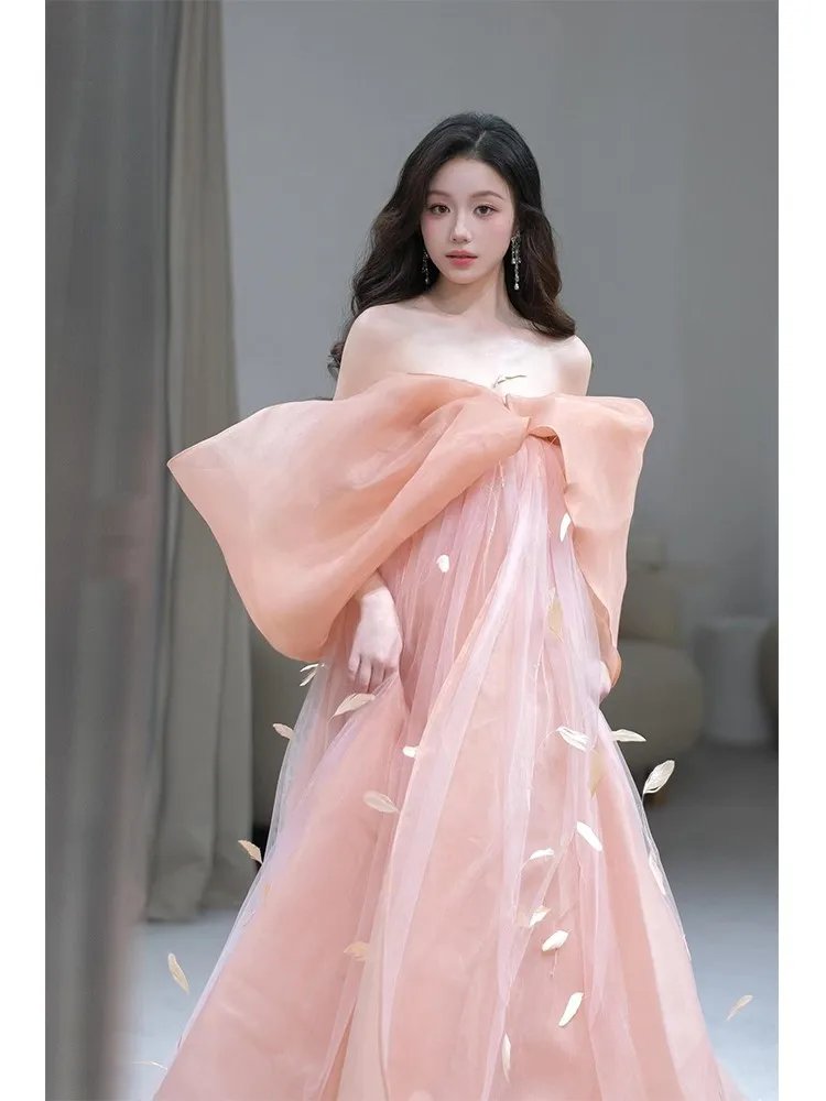 

A pink morning gown toast and one-shoulder birthday dress