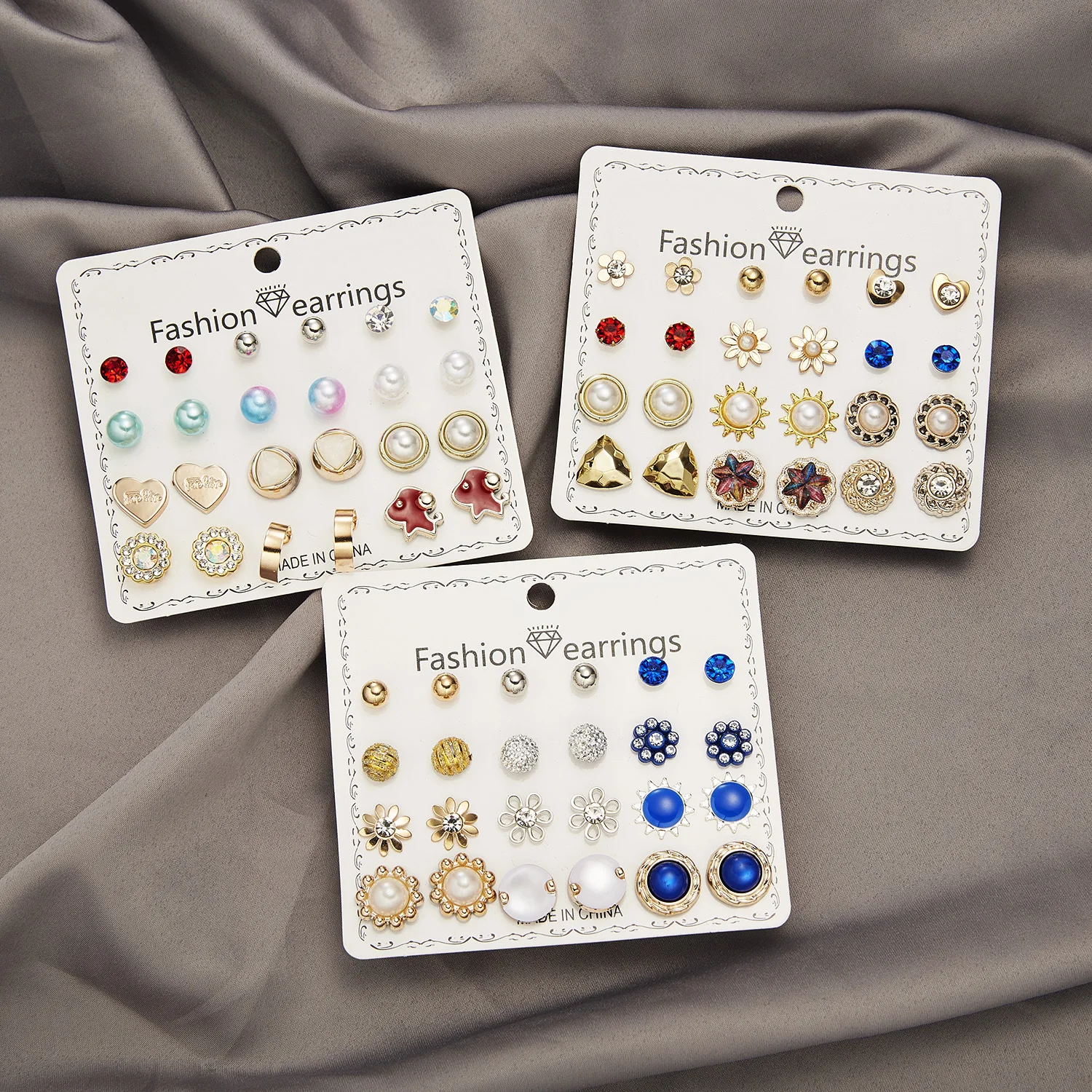 Factory direct sales, hot-selling 12 pairs of imitation pearl rhinestone gold ball combination card stud earrings, earrings set