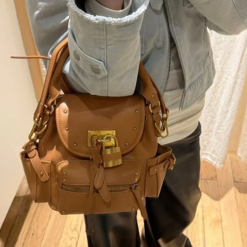 Niche Design Retro Versatile Lock Bag Rivet Backpack 2026 New High-end Temperament Commuting Handbag Sweet and Fashion Backpack