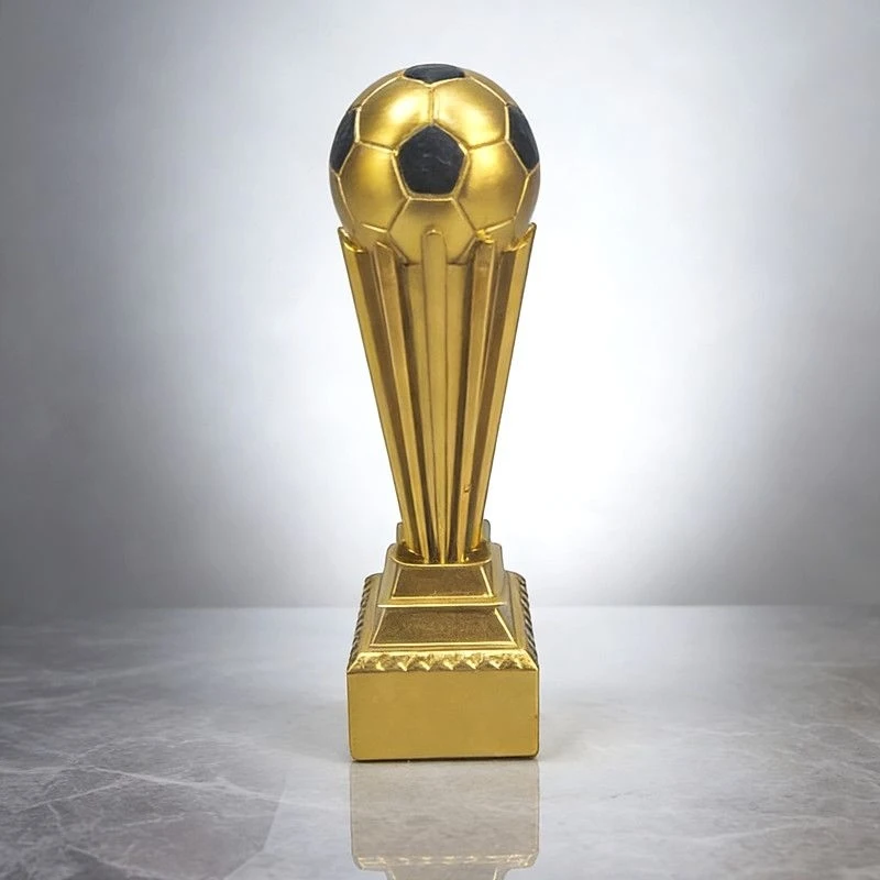 

Football match trophy Golden Ball Award related items, such as souvenirs, decorations for the stadium, and figurines for display