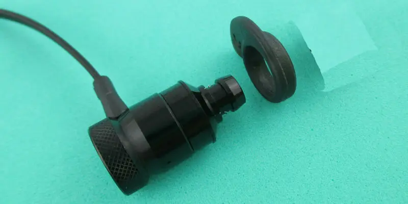 Aipinchun-2 pares de ganchos de silicona para auriculares, tapones para los oídos, accesorios para auriculares, color negro/claro