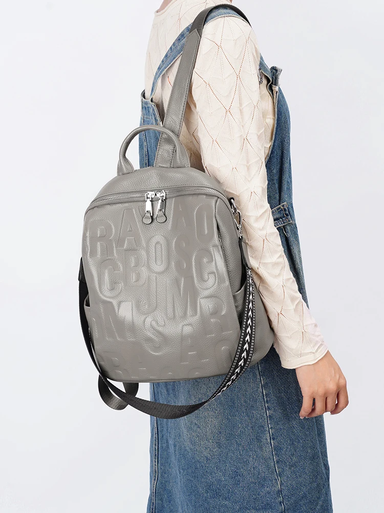 Zency 2026 New Fashion Casual Letter Daypack Genuine Leather Backpack Multi-pocket Convertible Shoulder Bag for Commuting