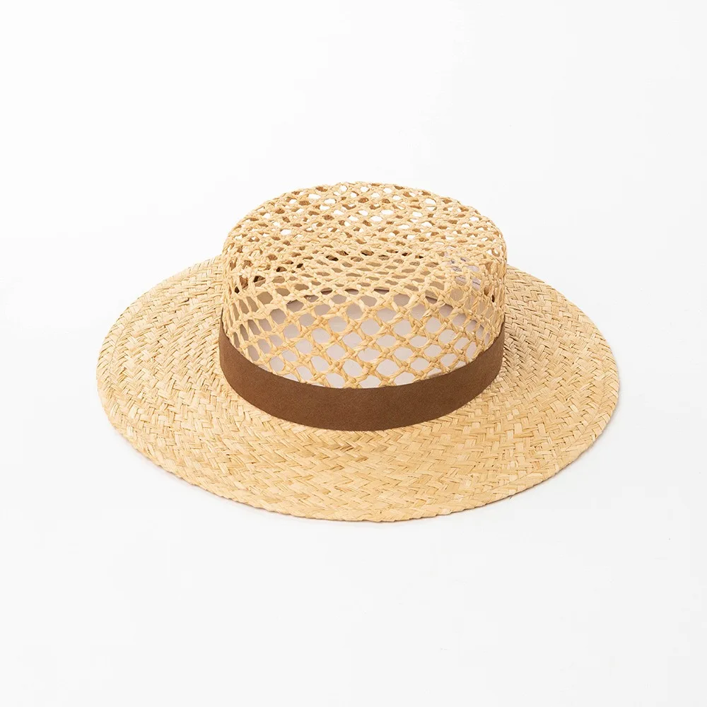 2026 New Fashionable Hand Woven Hollow Out Natural Grass Woven Hand Woven Wide Eave Flat Top Hat Outdoor Beach Sunscreen Hat