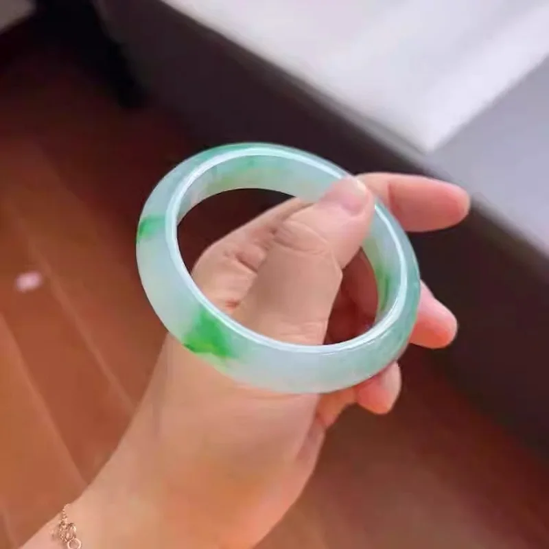 - from Myanmar's old mines, clear-bottom , ice-waxy jadeite bracelet in a regular circle, noble