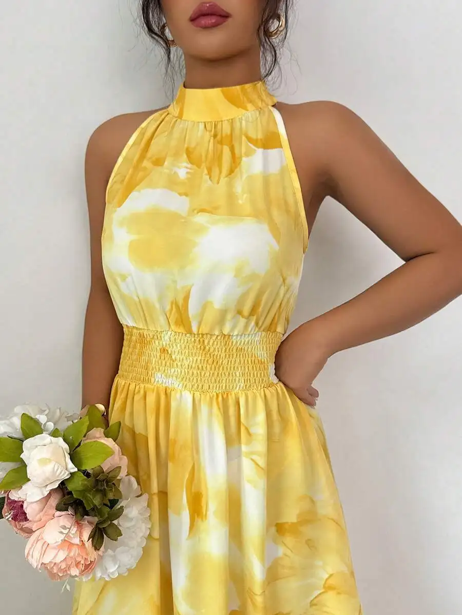 

Yellow White Watercolor Floral Halter Neck Sleeveless Dress With Smocked Waist And Flowing A-Line Maxi Skirt