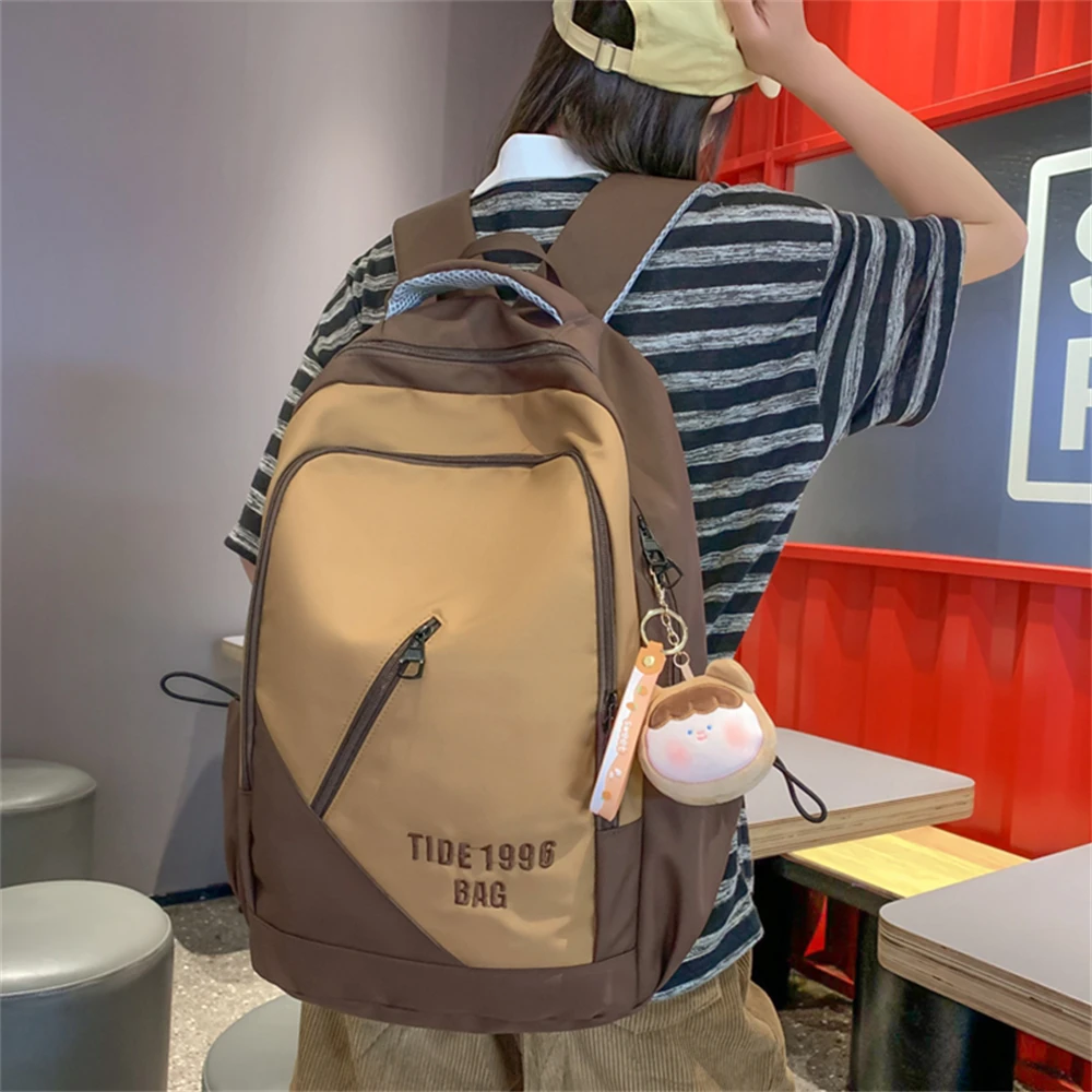 2023 painéis de grande capacidade sacos de escola de náilon mochila para mulheres de alta qualidade lazer saco de viagem para jovens unisex retalhos