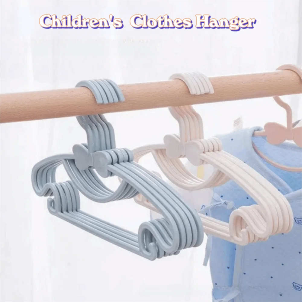 30 Uds. Percheros de Material plástico para ropa de bebé, bonito lazo, perchas portátiles para ropa para niños, organizador de armario grueso a prueba de viento, abrigos