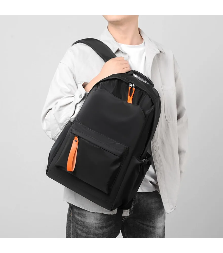 Shiny black casual backpack with orange fabric pull tabs anti splash lightweight waterproof fabric for teen school outdoor daily