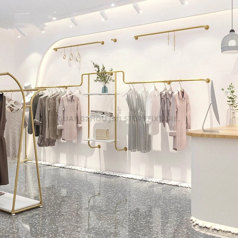 custom.Hot Sale Golden Clothes Rack Garment Wall Display Hangers Clothing Store