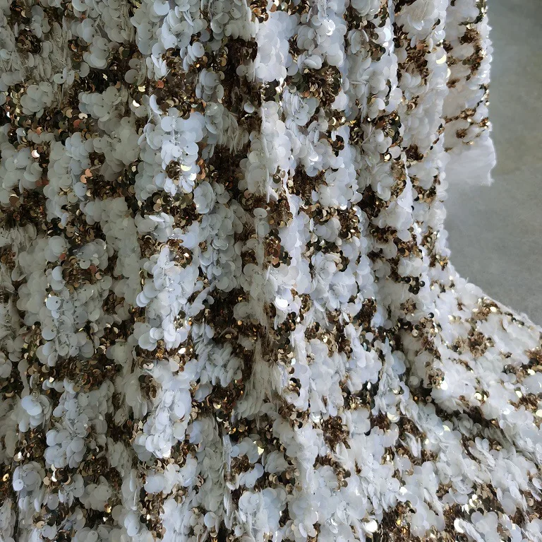 

Exquisite heavy-duty sequin embroidered fabric adorned with sequin embroidery fabric for gowns,dresses,designer fabrics