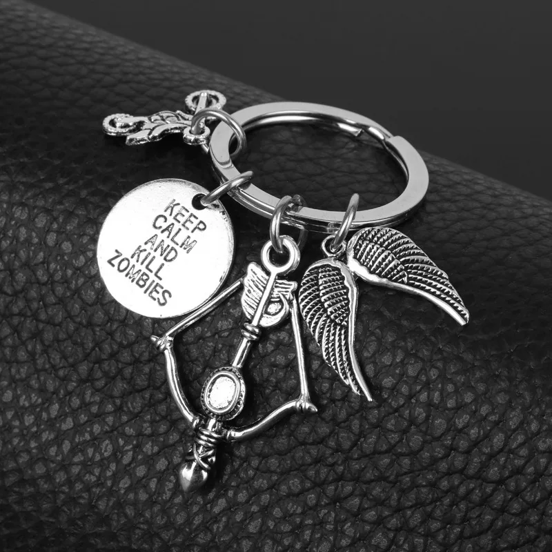 ウォーキングデッドキーチェーンガンメタル弾丸銃のペンダント、時映画の車のキーホルダー、trinketキーホルダー