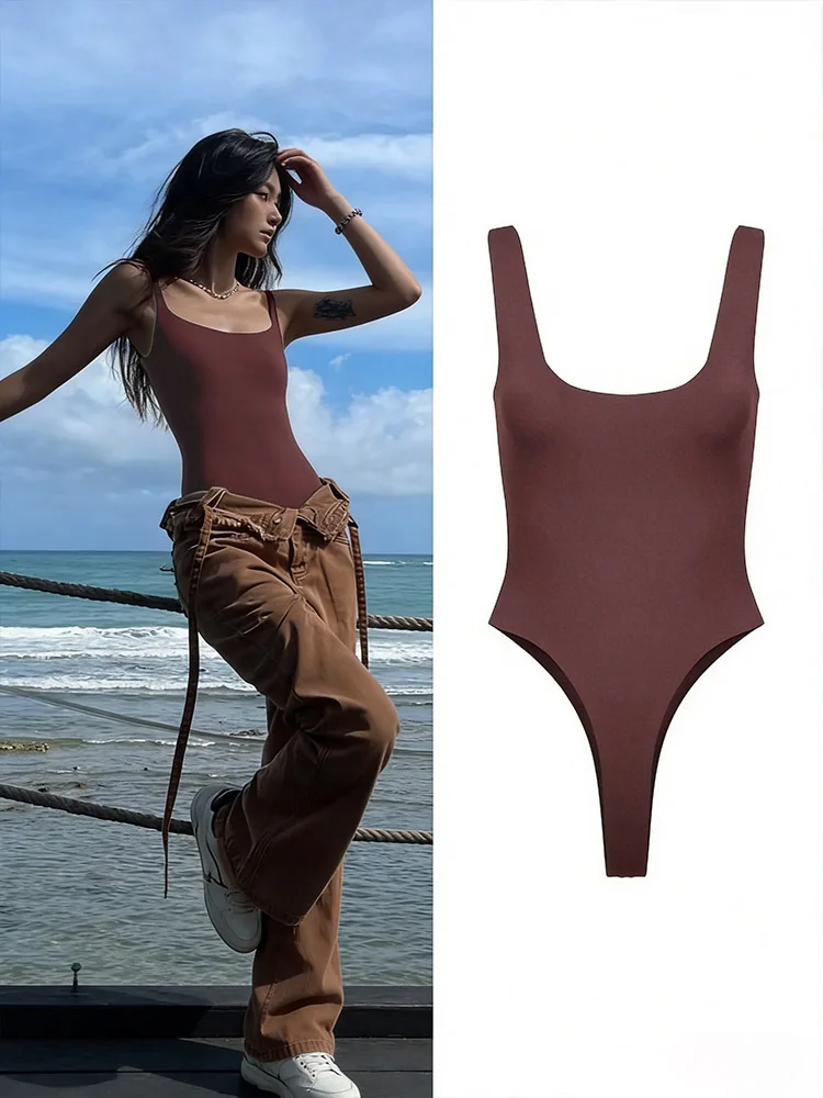 Sexy U-neck ribbed bodysuit with low cut, high waist & slim fit.Back straps & snap bottom. Perfect hot girl summer look!